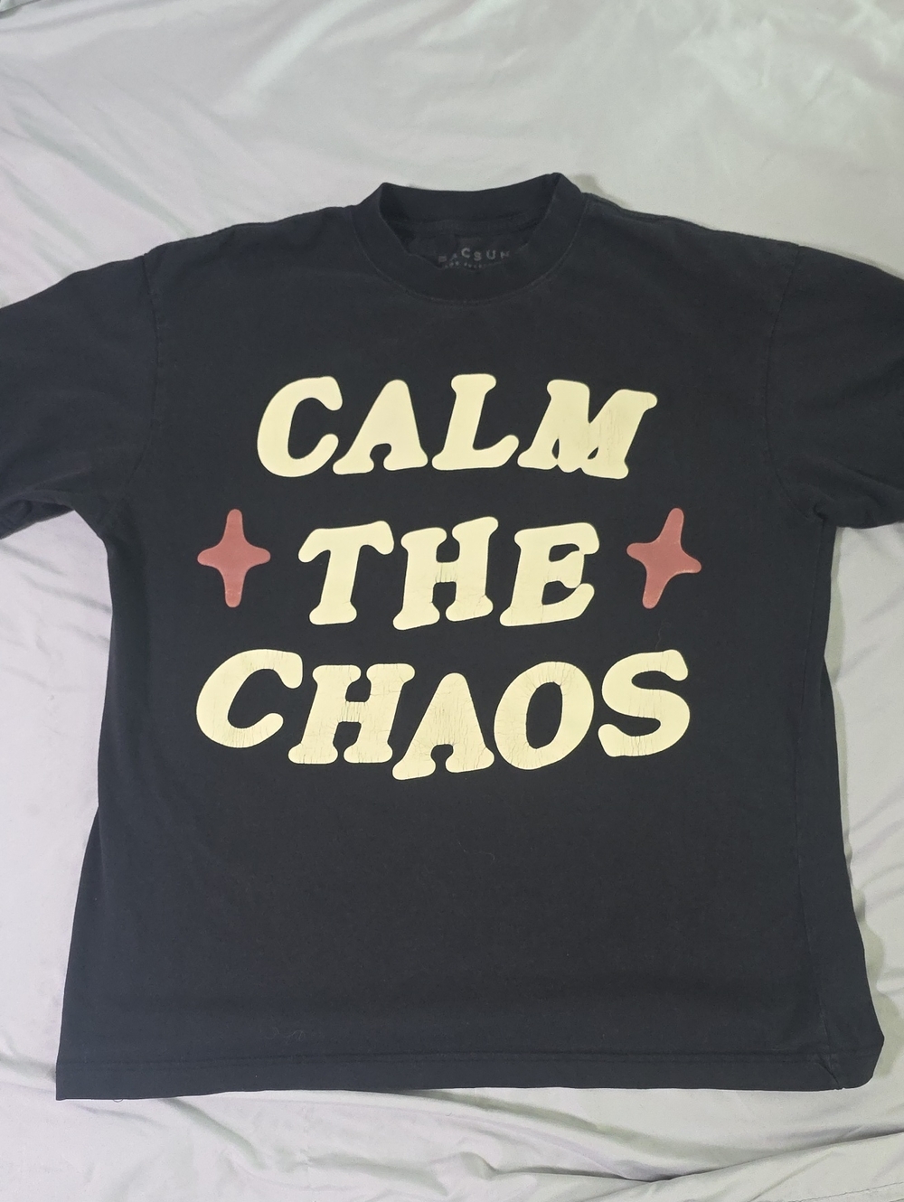 PacSun Black Tee with Cream Slogan and Pink Stars